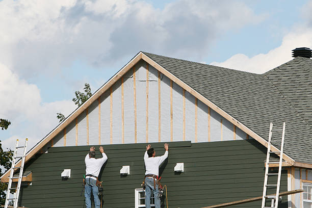 Professional Vinyl Siding technician working in Colmar, PA